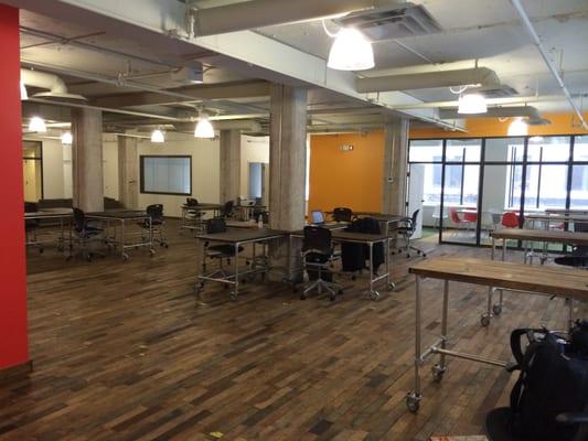 More open seating and a view of the conference room