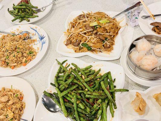String beans, beef chow fun, chicken fried rice, pot stickers, shrimp (dim sum)