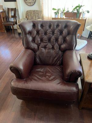 there are 2 oversized leather arm chairs that need the seat cushions restuffed