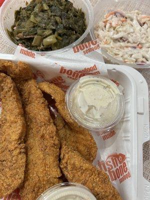 Got the Cajun catfish dinner with collard greens and coleslaw as takeout