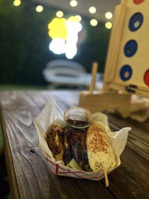 Birria tacos and street corn