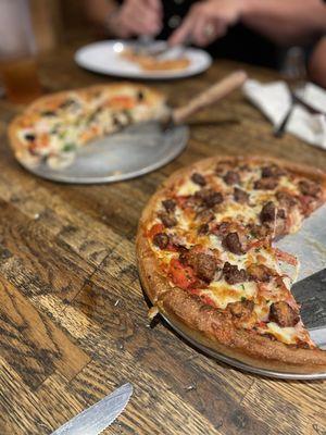 Greek and Meat Lovers pizza.