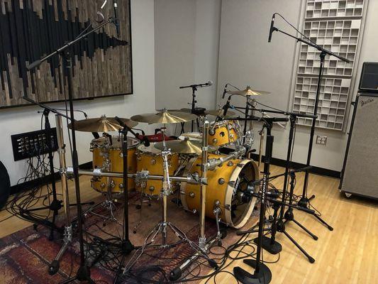 Drums with microphones setup and ready to record.