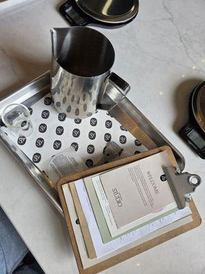 Welcome kit on the table with fragrance ideas and tip.