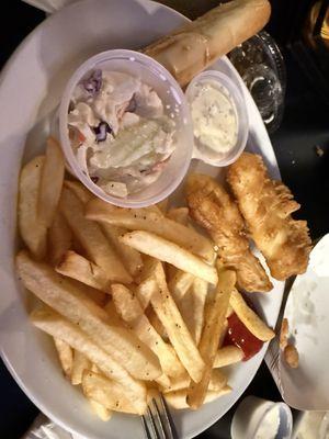 Beer battered fish with french fries and coleslaw.