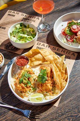 Fish Tacos - beer battered mahi mahi with chipotle crema, spicy tomatillo salsa, and tortilla chips