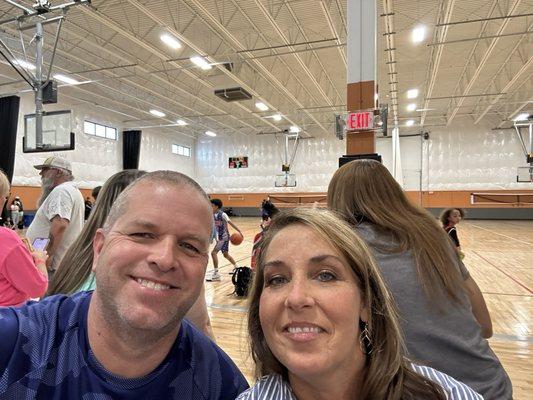 Aunt and uncle enjoying some basketball!