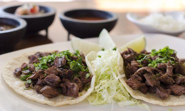 Tacos a Mano with homemade corn tortillas and carne asada.... ready for the amazing salsa bar!!!