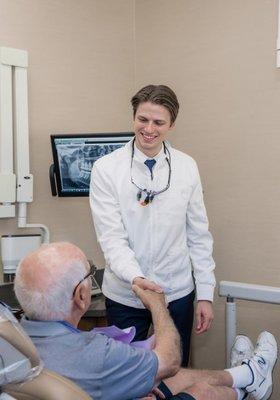 Dr. Connor Francis with the patient