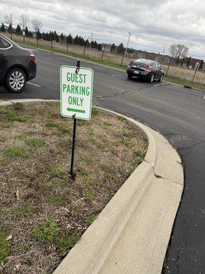 This is a photo of the guest parking sign. And I was parked on that side. The arrow was pointing.