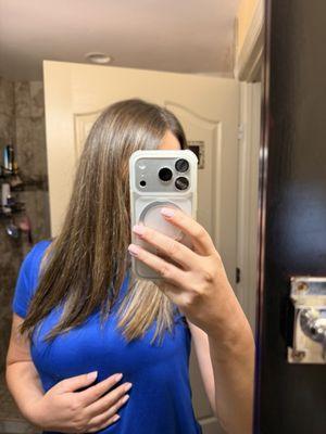 This is how she cut my very long hair saying it's a trim