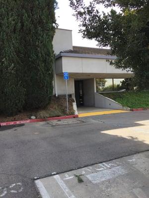 Back entrance next to the parking lot.