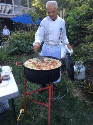 Paella for rehearsal dinner. Awesome show and meal.