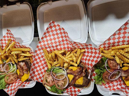 Bacon cheeseburgers with a side of fries to go