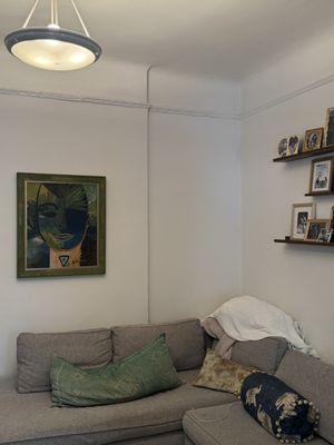 Painting with green and gold frame