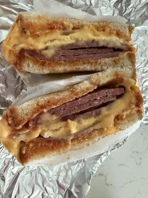 $11.35 for one eggs, cheese and salami. The men didn't even tell me how much to pay. Just said "here" to tap on his machine.