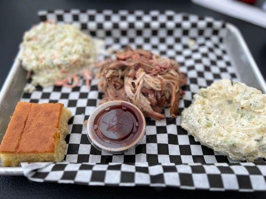 Pulled Pork Platter with potato salad, coleslaw and cornbread