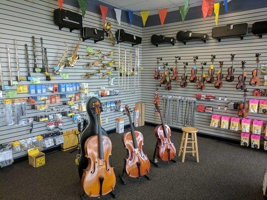 Violins, clarinets, trumpets, flutes, band instruments and cases
