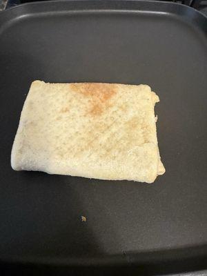 Pizza puff, had to cook it longer when I got home, I'm not sure why they thought this was fully cooked.
