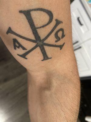 Chi Rho Cross. Should be all black. The trunk in the middle has lumps and the middle is fucked up.