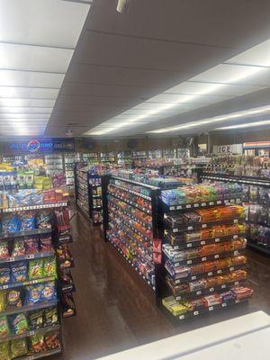 Grocery store with lot of candy option beer and lot of vape product with cheap gas in the neighborhood in Olympia