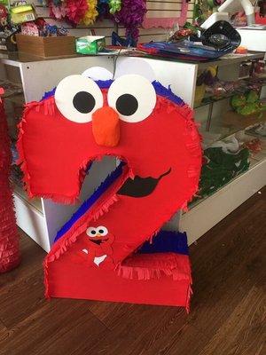 My custom cookie & Elmo piñata 2 piñatas in one !!!!!