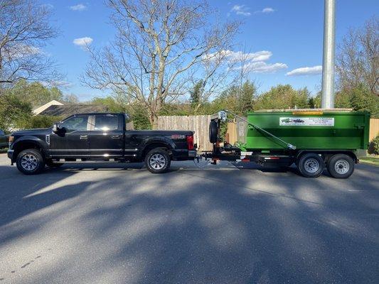 Truck and 11 Yard Roll Off Dumpster