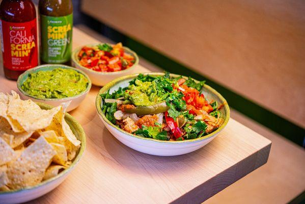 Meet your favorite kind of sunset - served in a bowl Fresh veggies, avocado, and a little spice.