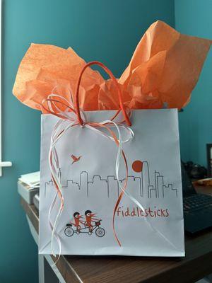 The complimentary gift wrapping provided by the store!