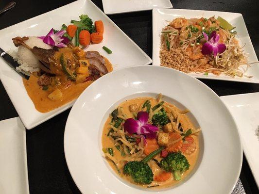 Duck dish, veggie curry, and shrimp pad Thai