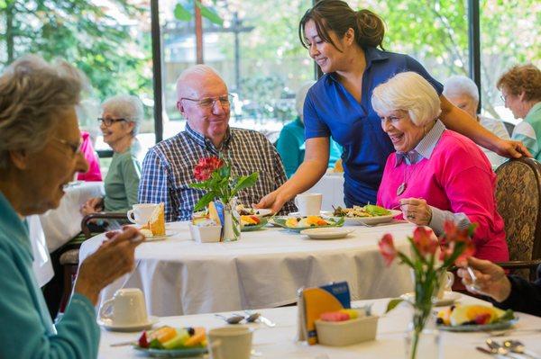 Jessica serving a delicious home cooked meal.