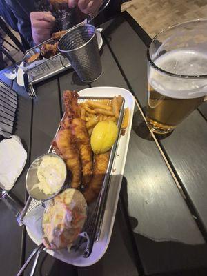 The Fish & Chips with an overpriced beer.