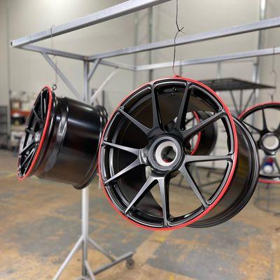 Satin black with gloss red lip