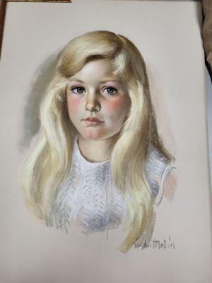 Survived fire that wiped out generations of photos.I want it handled with the utmost care. My child says she looks Targaryen from GOT