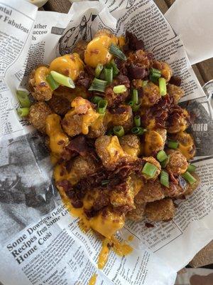 Loaded tots.  Nothing special but exactly what you'd expect.  Canned nacho cheese just saying as an fyi.