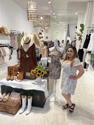 Shop owner displaying her pride in her small business.