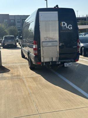 One of your vans that's taking up 4 entire parking spots in a packed lot.