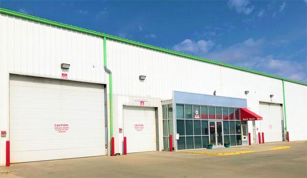 Front entrance with garage bays