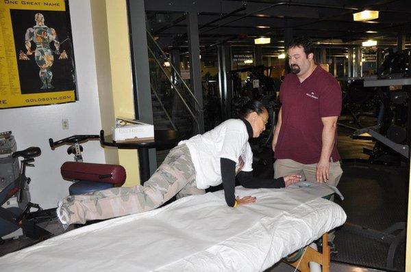 Holistic Health & Wellness at Gold's weightlifting event