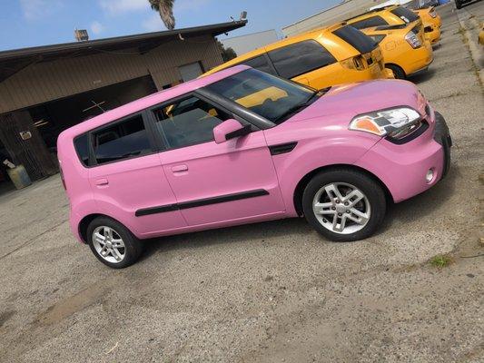 Car came in white left the shop with a nice pink paint job . Customer was happy