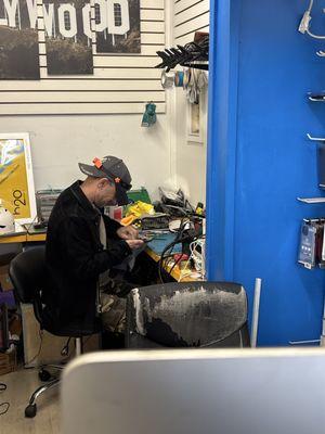 He cleaned my phone as well, he went above and beyond to provide excellent customer service.