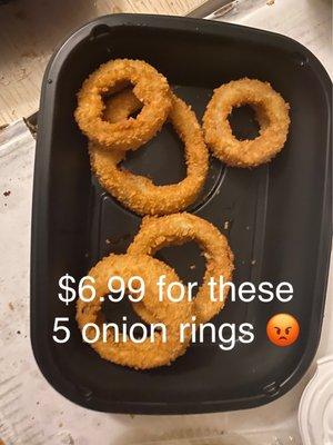 Cosmic Wings skimps on the onion rings you pay nearly 7 bucks for. Lame.