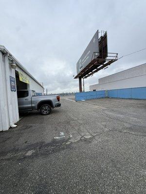 Shop is entrance at rosedale auto parts and bill board
