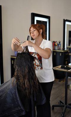 Expert haircut service tailored to your style, enhancing shape, texture, and confidence.