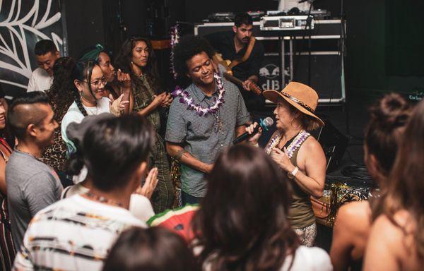 Lyanne on the mic at a Sougasm anniversary