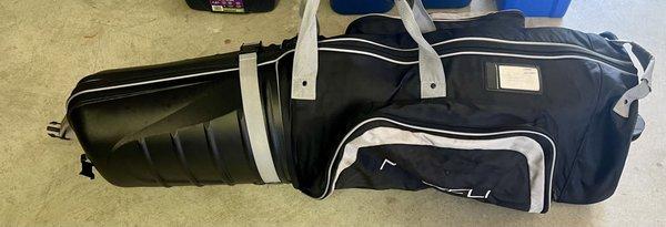 Broken strap clip on head cover.