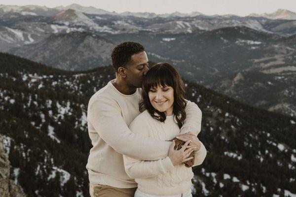 Man kissing Woman's Forehead | Colorado Couples Photographer in Mountains