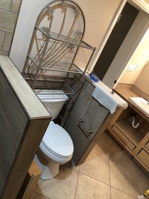 New toilet with privacy wall.