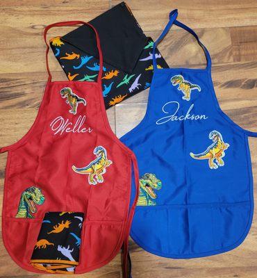 Custom embroidery on kids aprons with themed napkins