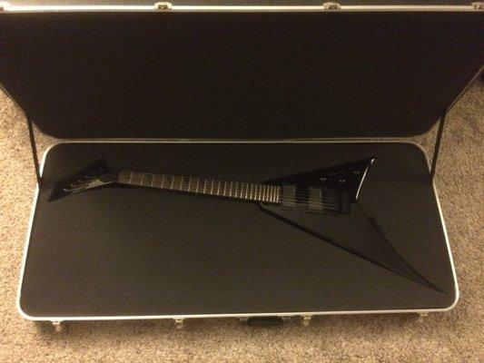Jackson Randy Rhoads Flying V with reverse headstock in a custom fitted case made by Neal at Left Coast Case and Sound. Awesome!
